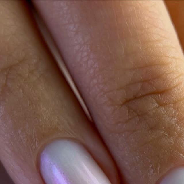 Pearl white manicure, close up
